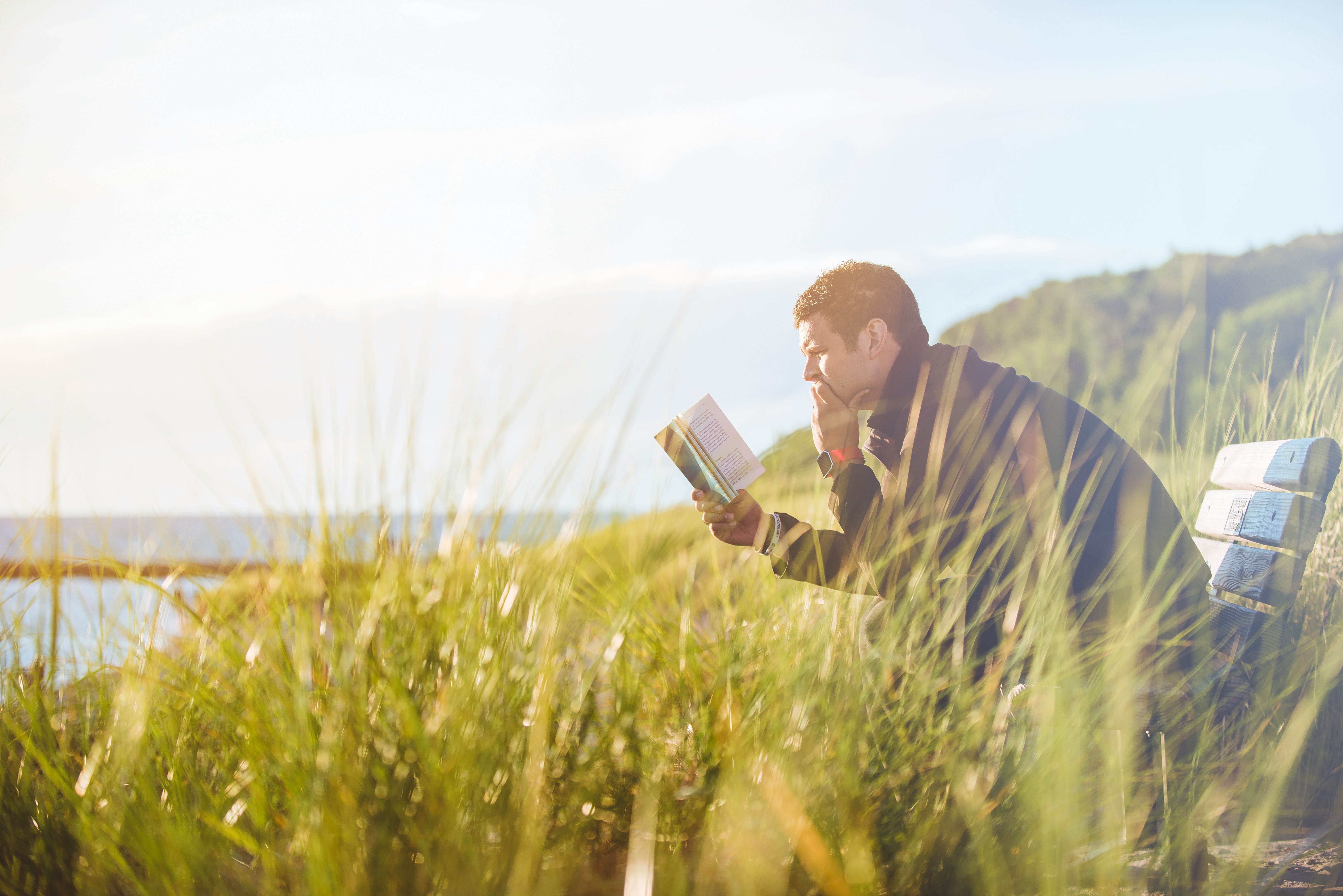 Individual student reading a book.